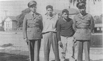 Nay Hernandez (second left) with his brothers
